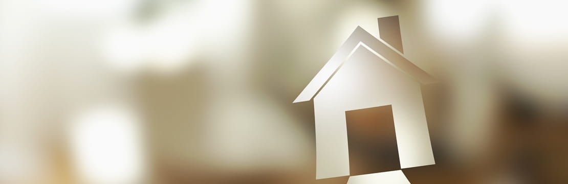Graphic of a house against a background of colored light